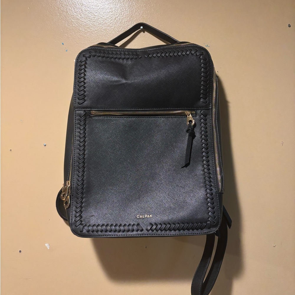 Calpak Black Backpack with Gold Zippers